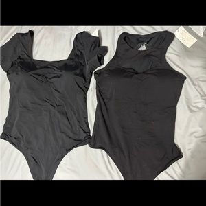 Two Klassy Network bodysuits